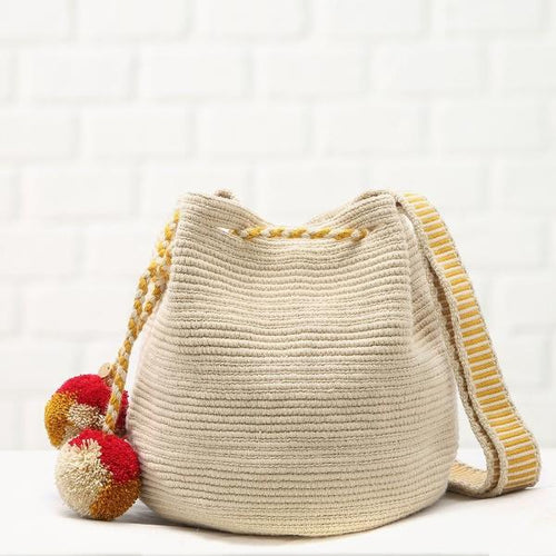 Chila Handmade Milena bag in beige with pompons and beoge and mustard strap